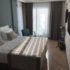 https://cdn.worldota.net/t/{size}/hotel_review/9d/05/9d05de050da570de431a0d683b19f0991dcca338.jpeg