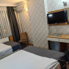 https://cdn.worldota.net/t/{size}/hotel_review/c9/06/c9065cd33946f779fe30457dc8d7f4efbcd210aa.JPEG