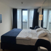 https://cdn.worldota.net/t/100x100/hotel_review/de/0a/de0a9d494b8700eb6dd1041b69f50a5324b6fbe7.JPEG