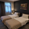 https://cdn.worldota.net/t/{size}/hotel_review/e1/c9/e1c99a183113d94e00ef0b39008e395c9df8a57e.JPEG