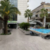 https://cdn.worldota.net/t/100x100/hotel_review/e9/86/e986944cdd39500ec28bccf574e43ead49382ad5.JPEG