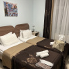 https://cdn.worldota.net/t/100x100/hotel_review/ec/12/ec1258569b9db74534554efa916ceed88c29307c.JPEG