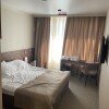 https://cdn.worldota.net/t/{size}/hotel_review/f1/1a/f11a4e26b0d842804c41159706d12cc844e1d518.JPEG