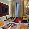 https://cdn.worldota.net/t/100x100/hotel_review/f3/75/f375913db6215bda71c34633271fd54317dd4d2f.JPEG