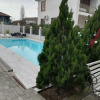 https://cdn.worldota.net/t/{size}/hotel_review/f4/e1/f4e10eeb1854a7f624a4ddcd512c485eb7a28591.JPEG