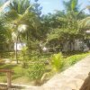 Отель Sheshe Baharini Beach Hotel на пляже Tiwi