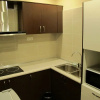 Отель Borneo Holiday Homes Serviced Apartment @ 1Borneo Tower B, фото 16