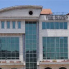 Отель Highland Hotel And Suites, фото 1