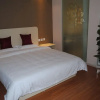 Отель Titan Caoyang Business Hotel, фото 1