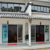Отель Dali Tujia Vacation Rentals (Gantong Villa), фото 1