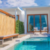 Отель White Whale Beachfront Pool Villa, фото 15