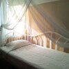 Отель Healing Lodge For Only Woman Guest House Miruku Ya (только для женщин) в Йомитане