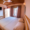 Отель New Breeze Thoddoo Inn, фото 5