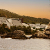 Отель Cala San Miguel Hotel Ibiza, Curio Collection by Hilton, фото 1