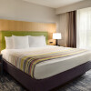 Отель Country Inn & Suites by Radisson, Pella, IA, фото 7