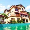 Отель Yangshuo Coco Garden Hotel, фото 1