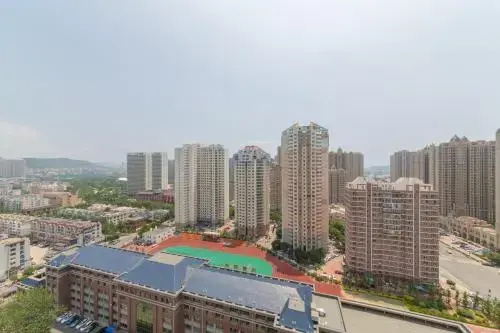 Aiqinhai ApartHotel