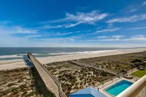 Oceanfront Condo with Beach Access, Pool, and Tennis Court by RedAwning