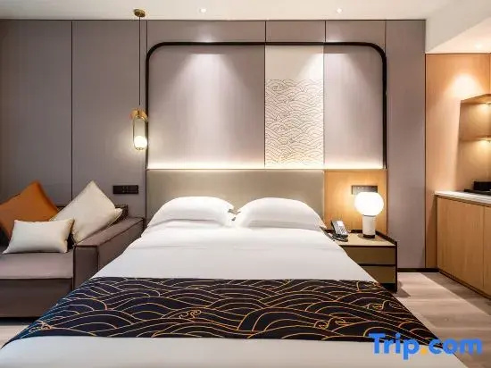 Huagang Hotel - Chambres