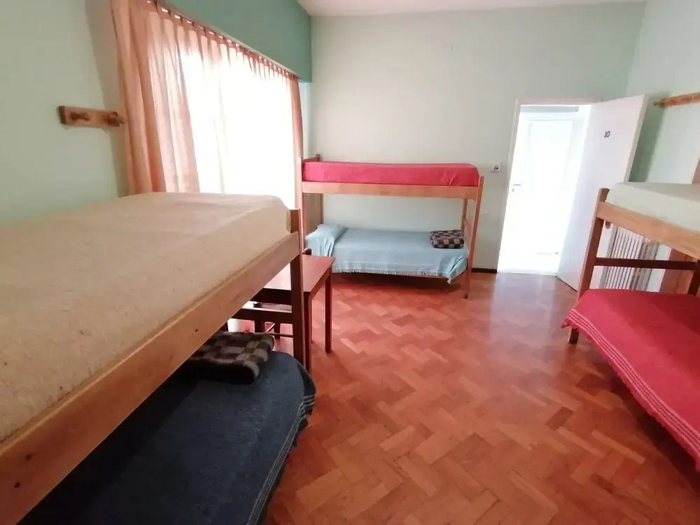 Кровать в общем номере в Alamo Hostel & Suites
