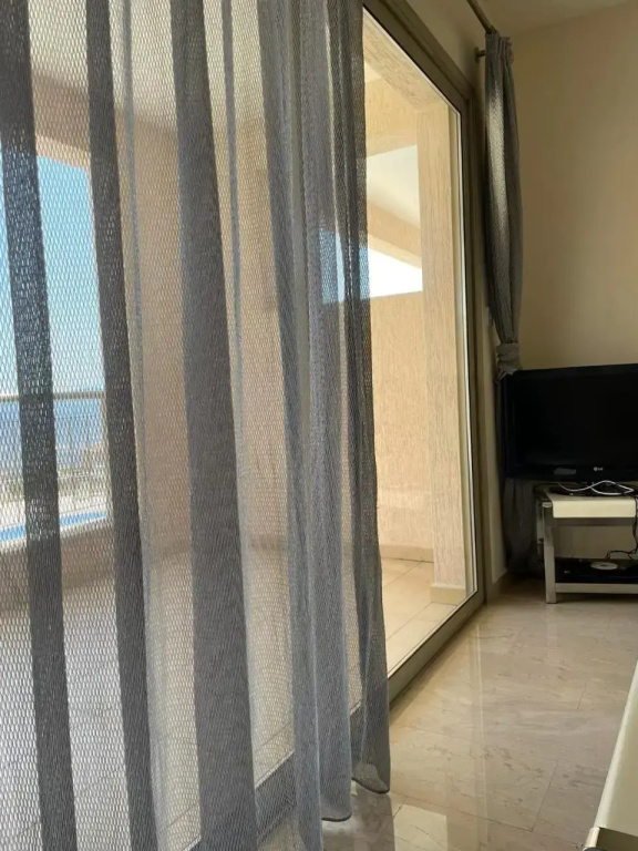 Relaxing 1 bedroom condo with pool and sea view