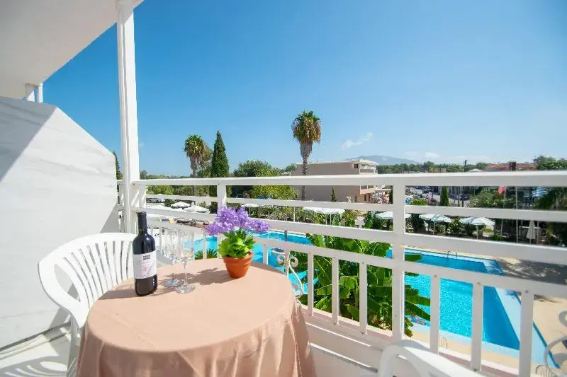 Classic Triple room with balcony and with pool view