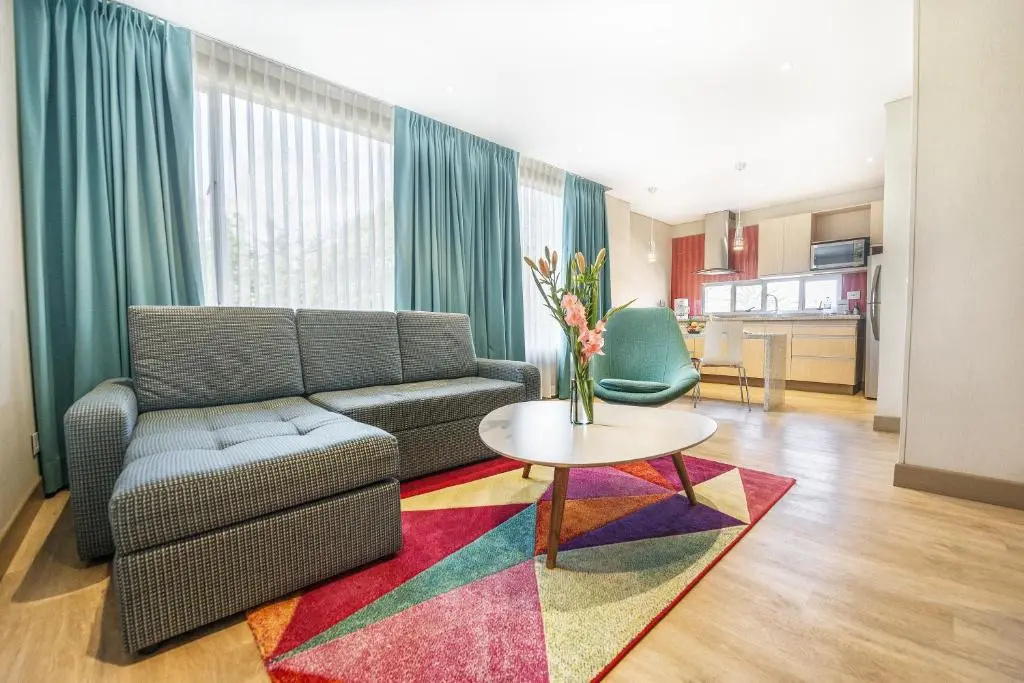 Hotel Plaza Suites - Chambres