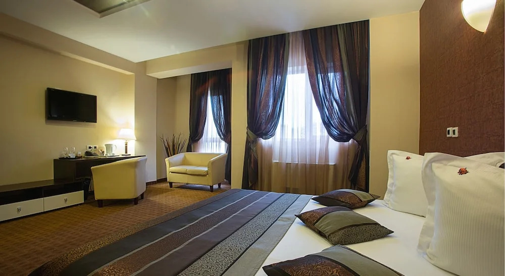 Четырёхместные апартаменты в Inter Business Bucharest Hotel
