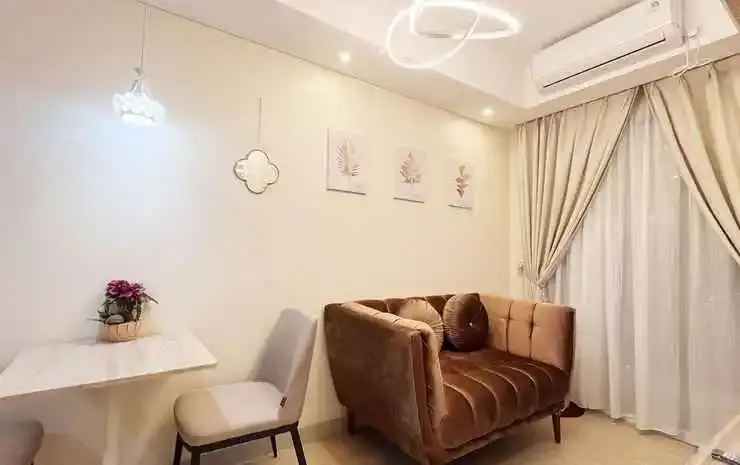 Homey and Good Deal 1BR Tamansari Skylounge Makassar Apartment By Travelio