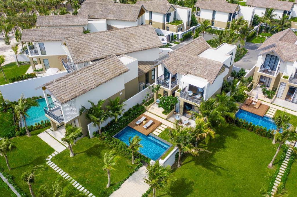 Вилла с бассейном Premium с 3 комнатами в Курортный отель New World Phu Quoc Resort