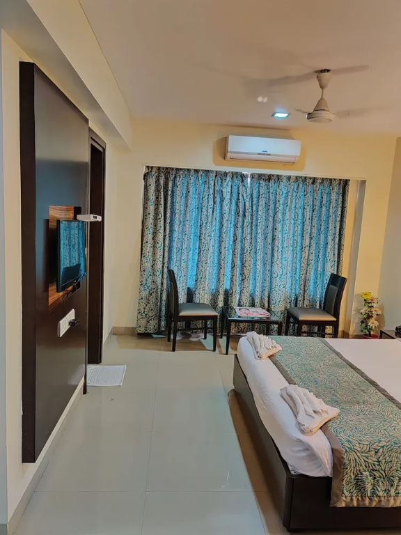 Hotel Reeva Regency - Chambres