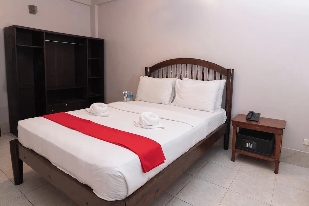 Kiwi Hotel - Chambres