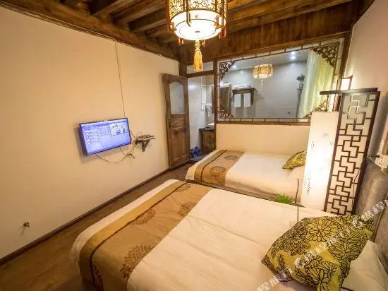 Lijiang Three Wells Inn - Chambres