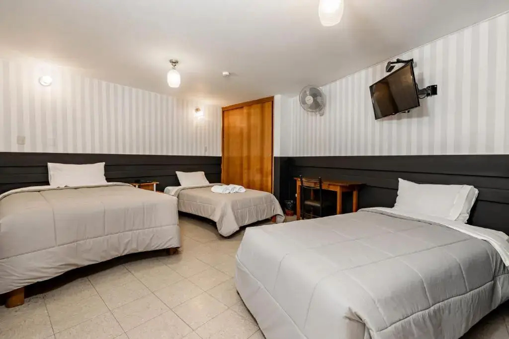 Miraflores Suites Centro - Chambres