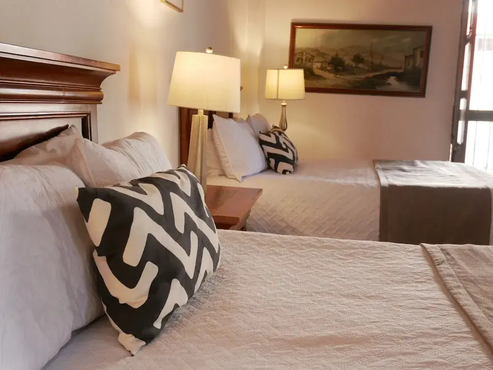 Hotel Hostal El Farol - Chambres