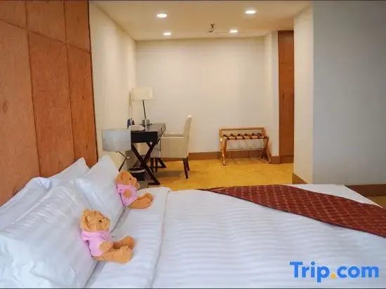 Jingguang Center Apartment Hotel - Chambres