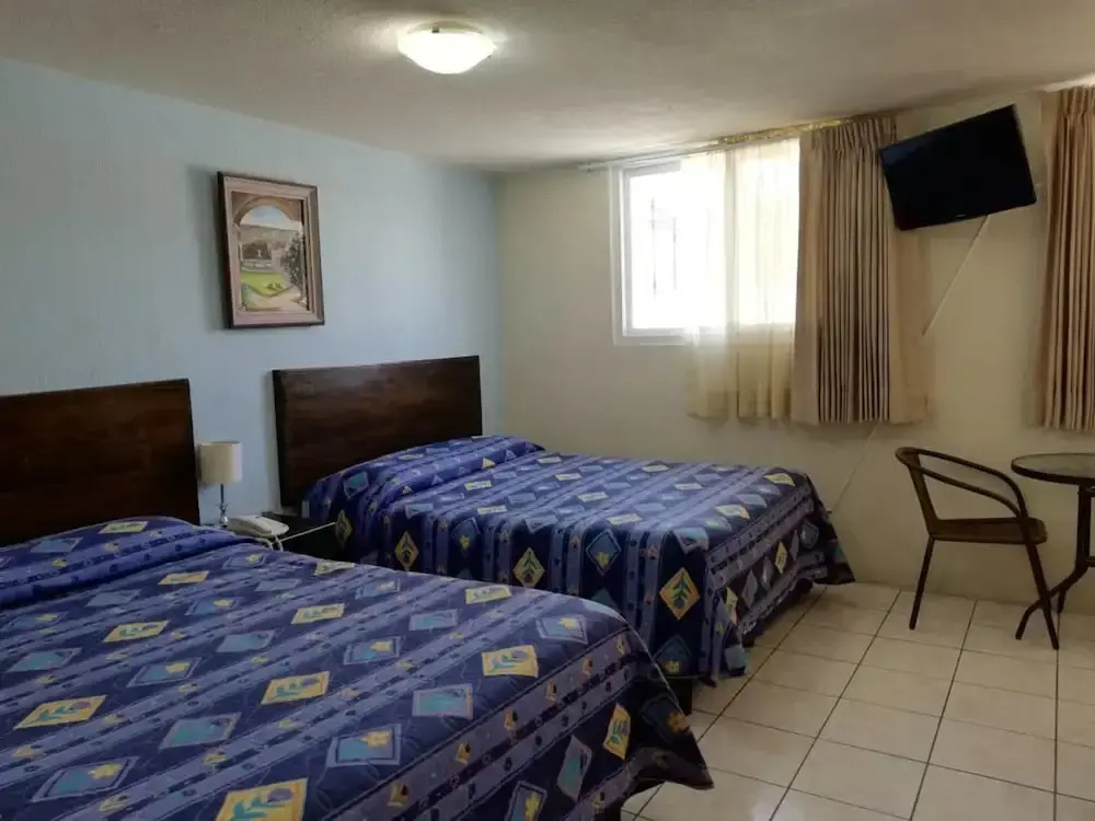 Mariana's Petit Hotel - Chambres
