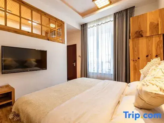 Jue Se Garden Theme Inn - Chambres