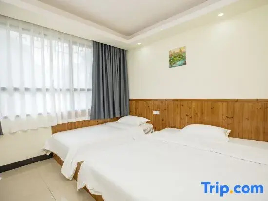 Huajun Hotel - Chambres