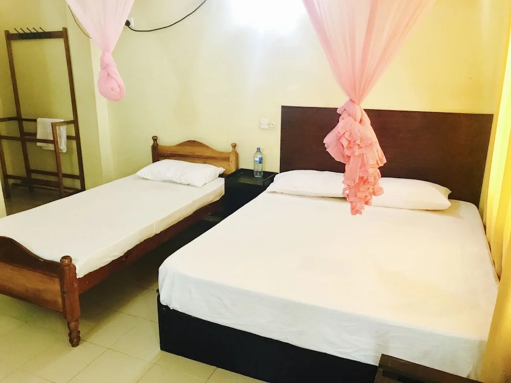 Palm Grove Holiday Inn - Chambres
