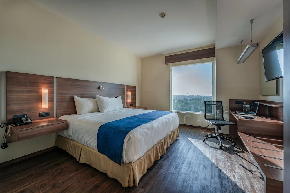 尊爵四合一豪華客房，配有雙人床