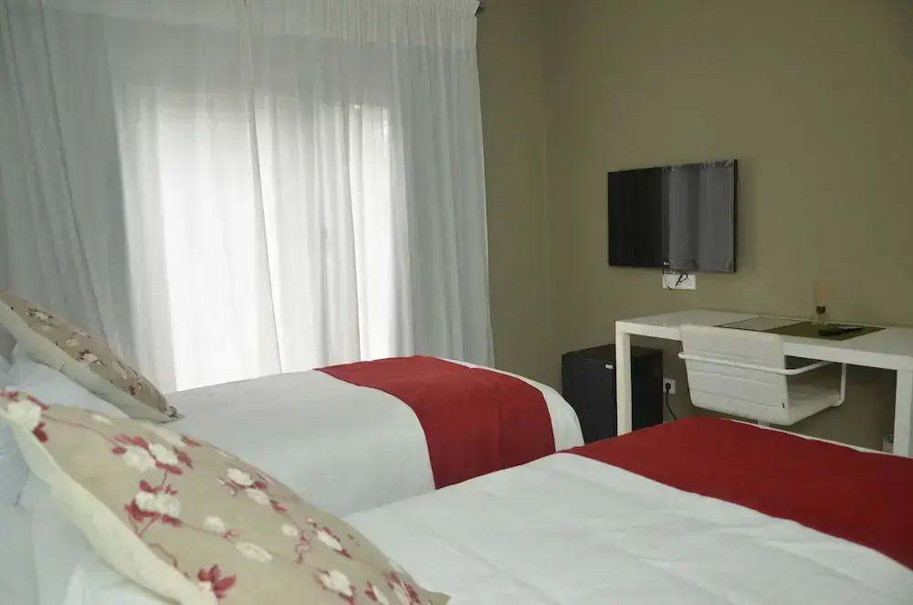 Magno Suites - Chambres