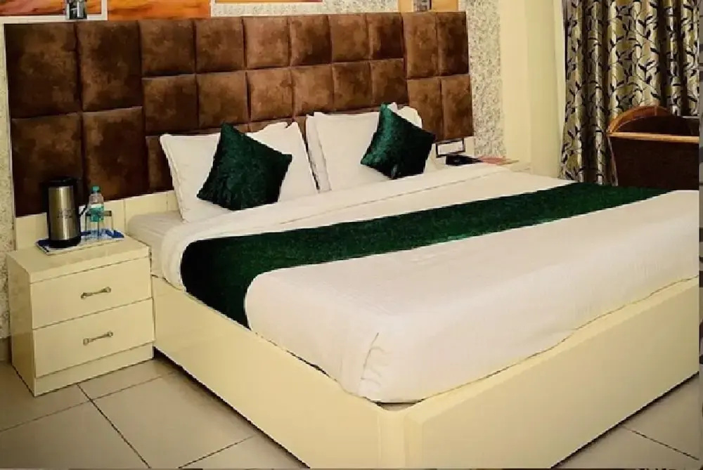 Hotel Devi Grand - Chambres
