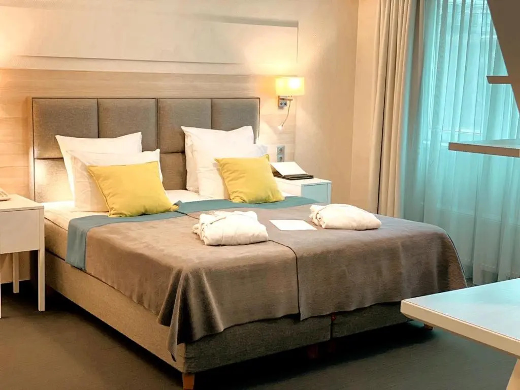 Amrita Hotel - Chambres