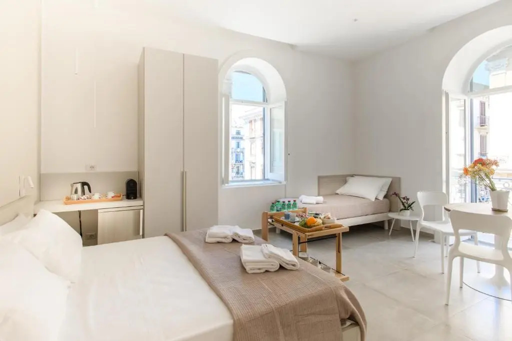 Standard Triple room with balcony and with partial sea view