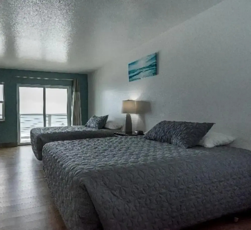 Standard Quadruple room with balcony and oceanfront