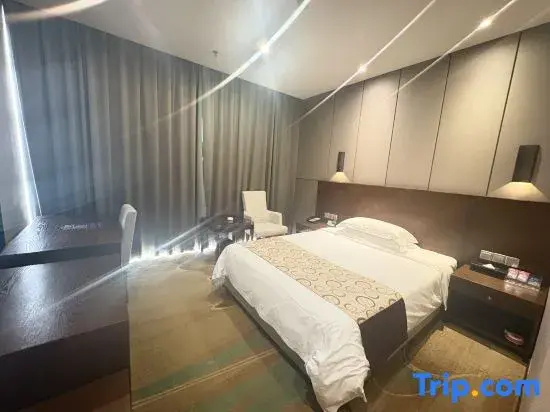 Xinhua Hotel - Chambres