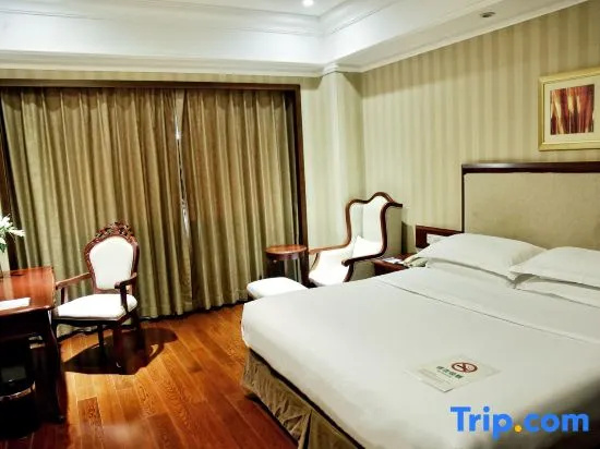 Enrichee Gloria Plaza Hotel - Chambres