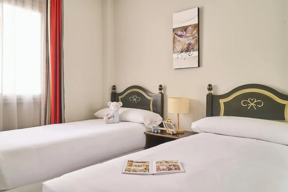 Apartamentos Ona Campanario - Chambres