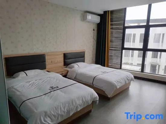 Xinxiang Hotel - Chambres